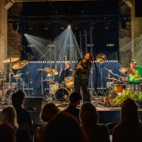Three drummers: Danish Kresten Osgood, German Christian Lillinger and Lithuanian Arkady Gotesman with Estonian-Danish saxophone player Maria Faust. © Teet Raik, Ratestuudio