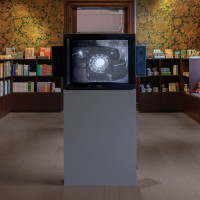 The video work Telephones (1995) by artist and composer Christian Marclay greets visitors in the gift shop.